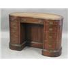 Image 1 : An Edwardian mahogany kidney-shaped desk with a leather inset over nine drawers around a central...