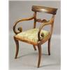 Image 1 : A Regency mahogany armchair with a carved splat on sabre legs Est. 320/380...