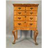 Image 1 : A strung walnut chest of two short and three long drawers, 18th century and later on an associate...