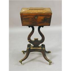 A Regency rosewood work table on a large shaped support with swept feet, 41cm Est. 550/600...