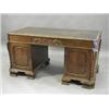 Image 1 : A Chippendale style mahogany twin pedestal desk having a leather writing surface over three friez...