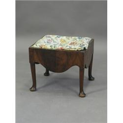 A George I walnut stool with a drop in seat over a deep frieze and pad foot legs, 48cm square Est...