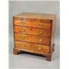 Image 1 : A George III mahogany chest of four long graduating drawers, beneath a brushing slide, raised on...