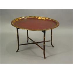 A 19th century oval toleware tray on a later stand, 76cm wide Est. 200/300...
