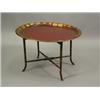 Image 1 : A 19th century oval toleware tray on a later stand, 76cm wide Est. 200/300...