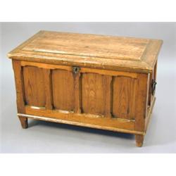 An Arts & Crafts pine coffer with a panelled front and sides and iron ring handles, 89cm wide Est...