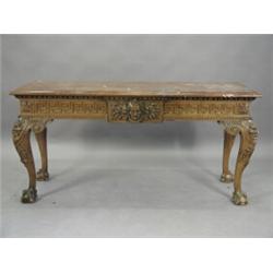 An antique pine console table having a veined marble top over a frieze with egg and dart, Greek k...