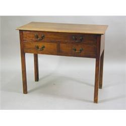 An antique oak side table with three drawers on square chamfered legs, 91cm wide Est. 450/650...
