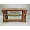 Image 1 : A 19th century mahogany serving table raised on square columns with a single undertier, on an inv...