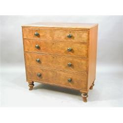 A Victorian mahogany veneered chest of drawers, each drawer with cockbeading and turned bun handl...
