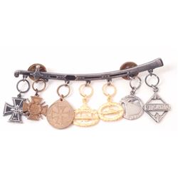 LOT OF 7 GERMAN NAZI MINIATURE CHARMS ON SWORD PIN