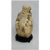Image 1 : A bone carving of Longevity God figure