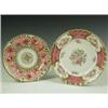 Image 1 : Two plates: one Coalport, painted with reserved coloured flower bouquets and a pink and gilt b...