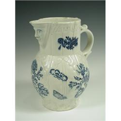 A rare 18th Century Lowestoft copy of a Worcester 'Cabbage Leaf' jug, with an animated moulded...