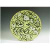 Image 1 : A large yellow ground Chinese dish, with black chi lung wreathing amongst white enamel peony a...