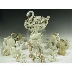 A collection of 17 various china swans, including makers Robinson & Leadbeater & Sitzendorf, v...