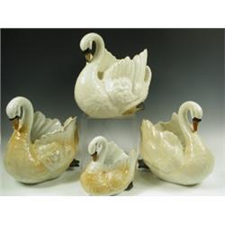 Three large Victorian pottery swans, and a similar smaller swan, some damage, tallest 30cm ...