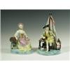Image 1 : A pair of French porcelain figures of an officer and his wife drinking on a green base, with p...