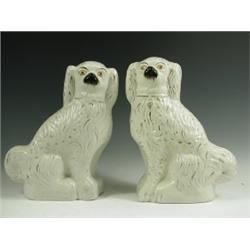 A pair of large Victorian Staffordshire pottery dogs with gilt decoration, gilt rubbed, 38cm h...