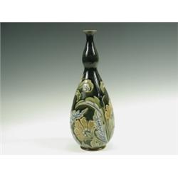 A Doulton Lambeth 'Eliza Simmance' ovoid vase with a knopped neck, 31cm high Est. 200/250...