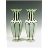 Image 1 : A pair of mid 19th Century green glass, white overlay vases cut with panels and gilt stiff lea...