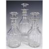 Image 1 : Three 19th Century decanters with mushroom style stoppers and three neckrings above facetted b...