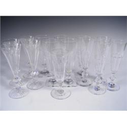 Fourteen late l9th/early 20th Century tall wine glasses comprising a set of 5, 2 x sets of 4 a...