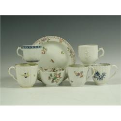A Bow blanc de chine moulded teacup, a blue and white floral moulded Bow teacup, two pieces of...