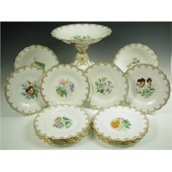 A Victorian porcelain dessert service, each piece with floral sprays to the centre and gilt la...