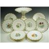 Image 1 : A Victorian porcelain dessert service, each piece with floral sprays to the centre and gilt la...
