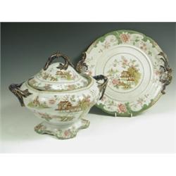 An ironstone soup tureen cover and stand c.1840, transfer printed in brown and colours with ch...