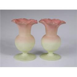 A pair of Thomas Webb Queens Burmese glass vases, each marked to the underside, 11.5cm high.<b...
