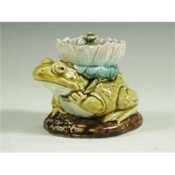 An unusual French majolica ink well in the form of a toad with a lily pad holder on its back,...