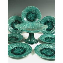 A Staffordshire green ground part dessert service, each piece moulded with leaves and fruit, c...