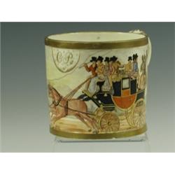 A large early 19th Century monogrammed, pottery cup, painted with a continuous landscape scene...