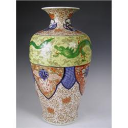 A large late 19th Century Fukagawa porcelain vase decorated with a green dragon amongst clouds...