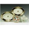 Image 1 : A pair of Derby dishes of oval form, each painted with a crest to the centre, of a crow on a s...