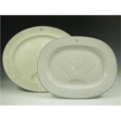 Four Royal Worcester vitreous china meat plates, each with a printed crest and two with reserv...