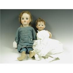 An Armand Marseille 390 bisque head doll with a mohair wig, sleeping eyes, a wooden and compos...
