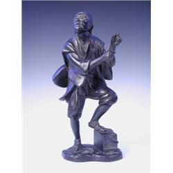 A late l9th Century Japanese bronze figure of a musician, cast character marks verso (instrume...