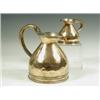 Image 1 : A 19th Century copper quart measure of waisted bulbous form, having a flared lip and applied h...