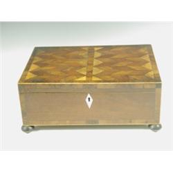 An early 19th Century crossbanded mahogany workbox with a cube parquetry lid and bun feet, the...