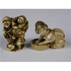 A Japanese ivory netsuke carved as a man carrying a child in a basket, inset red seal mark and...