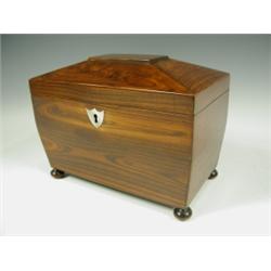 A good Victorian rosewood tea caddy, with a mother of pearl escutcheon and two internal lidded...