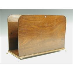 A Regency mahogany book trough with plain boarded sides, a moulded plinth and brass ball and c...