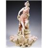 Image 1 : An early 20th Century Royal Dux figurine, modelled as a young maiden descending from a rocky m...