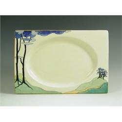 A Clarice Cliff rectangular 'Blue Firs' pattern Biarritz plate, 1937, printed with blue trees...