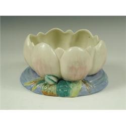 A Clarice Cliff 'Lily Pond' bowl with pink petals on a blue and green base, printed mark, 12.5...