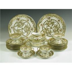 A Noritake tea service, each piece richly relief gilded and with rose sprays with 'spider mark...