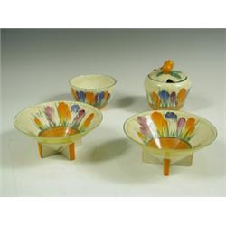 A pair of Clarice Cliff bizarre 'Autumn Crocus' pattern conical bowls, each with printed and p...